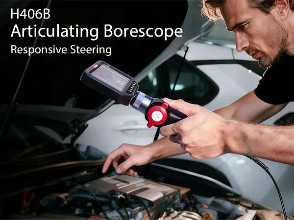 Man using H406B articulating borescope with responsive steering to inspect car engine under hood